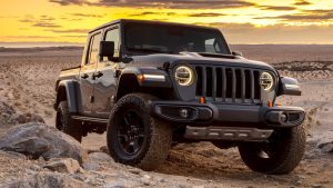 The 2022 Jeep Gladiator driving in the desert.